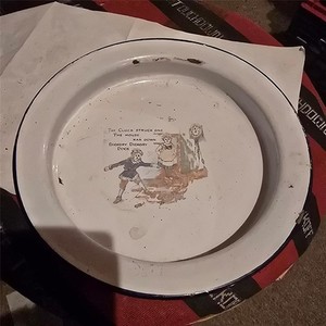 Antique enameled baby plate of fairy tale of the mouse running up the clock