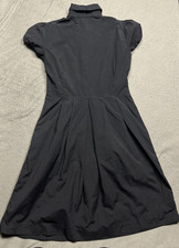 flared mini dress in stretch chino ALINA PLEATED KNIT FIT AND FLARE MINI DRESS IN NAVY – AKIRA