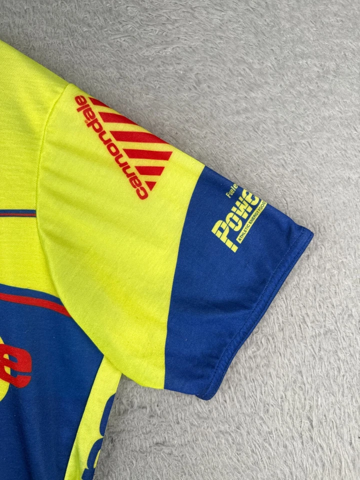 Camiseta deportiva de ciclismo Cannondale vintage para adulto mediana amarilla azul 1/4 cremallera US Sprint Foto 2 de 4