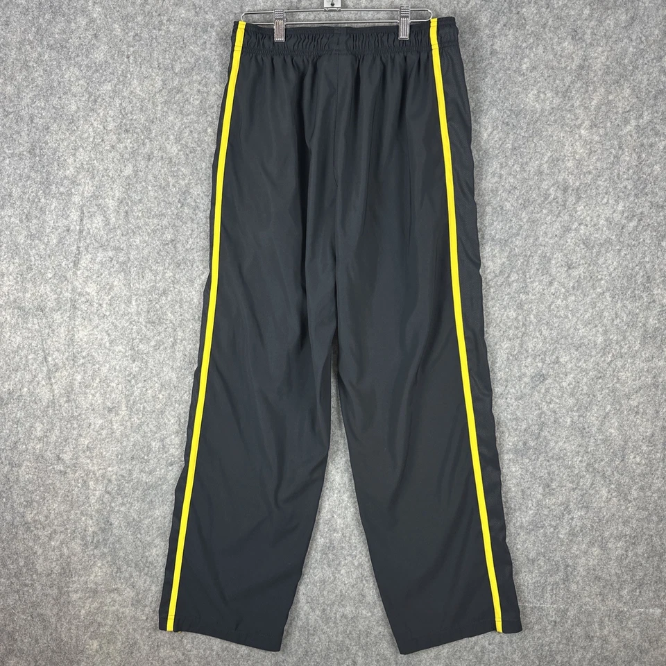 Pantalones deportivos Under Armour para hombre M sueltos negros/amarillos bolsillos a rayas cremallera al tobillo Foto 2 de 4