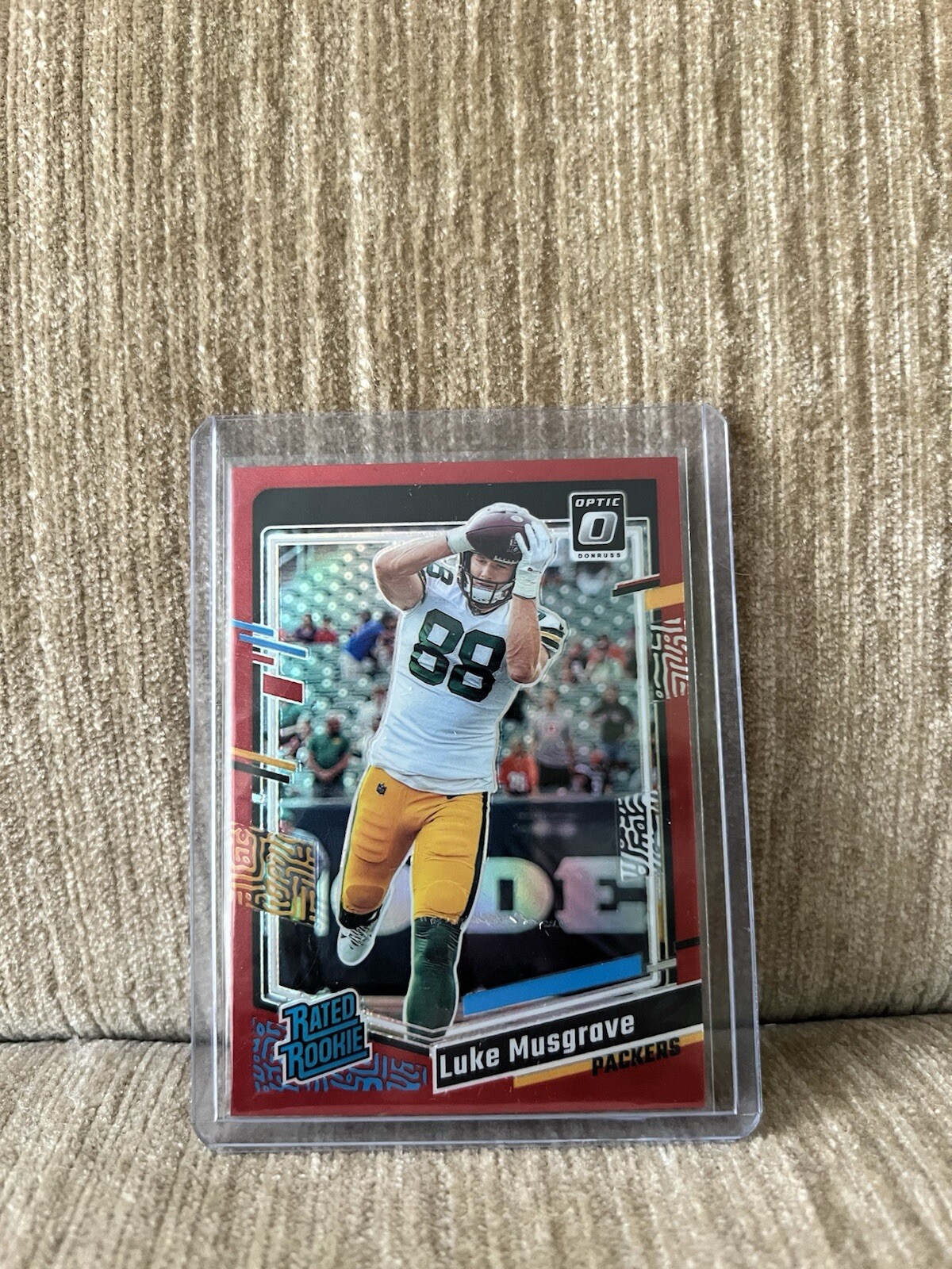 2023 Donruss Optic Football Luke Musgrave #241 Red Rated Rookie #33/99 RC