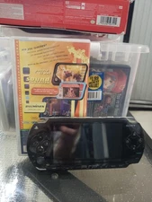 Sony PSP-1001 Console with New Battery, Charger and One Game