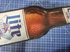 Vintage Miller Lite Pouring Bottle Embossed Tin Sign