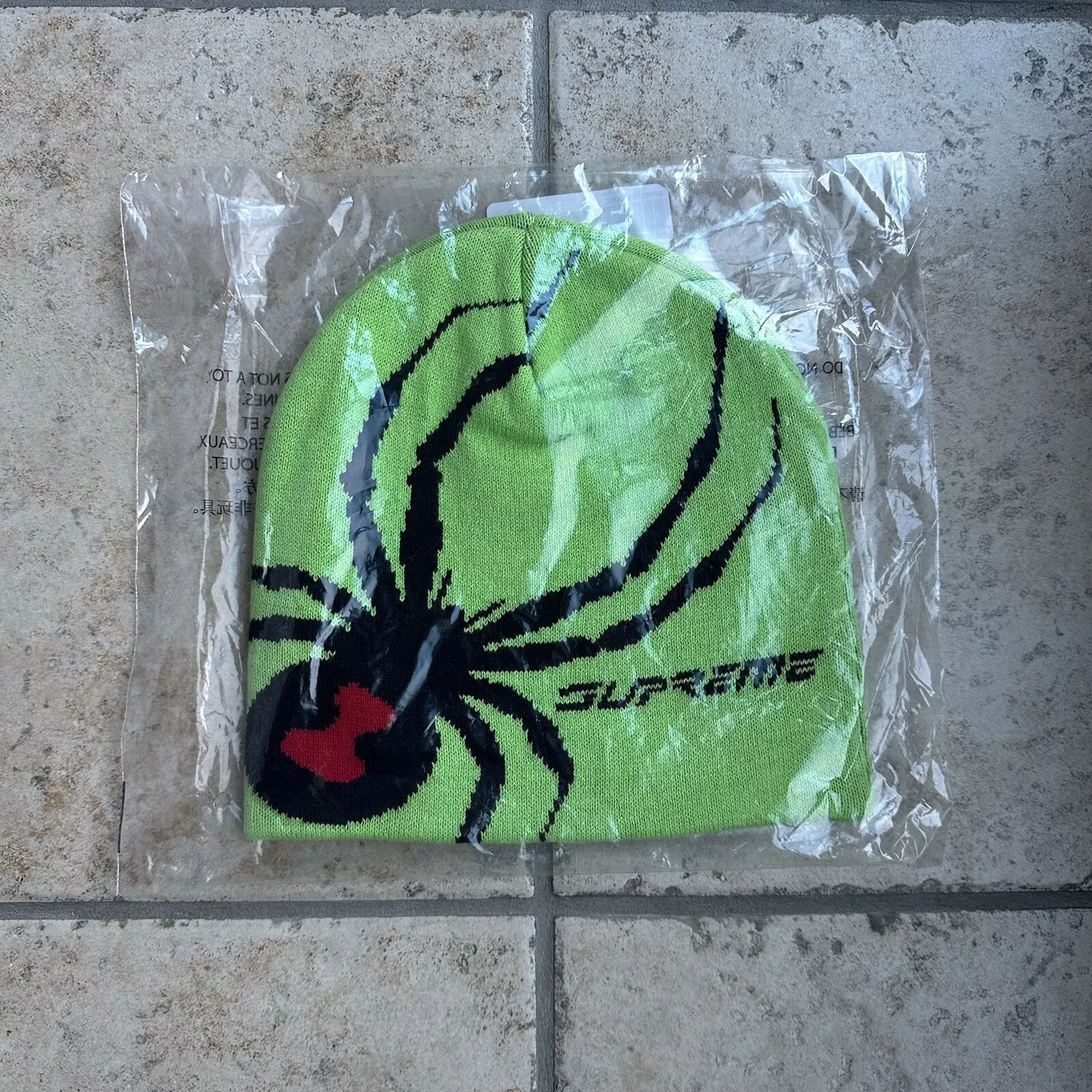 Bonnet Supreme Spyder vert neuf en main