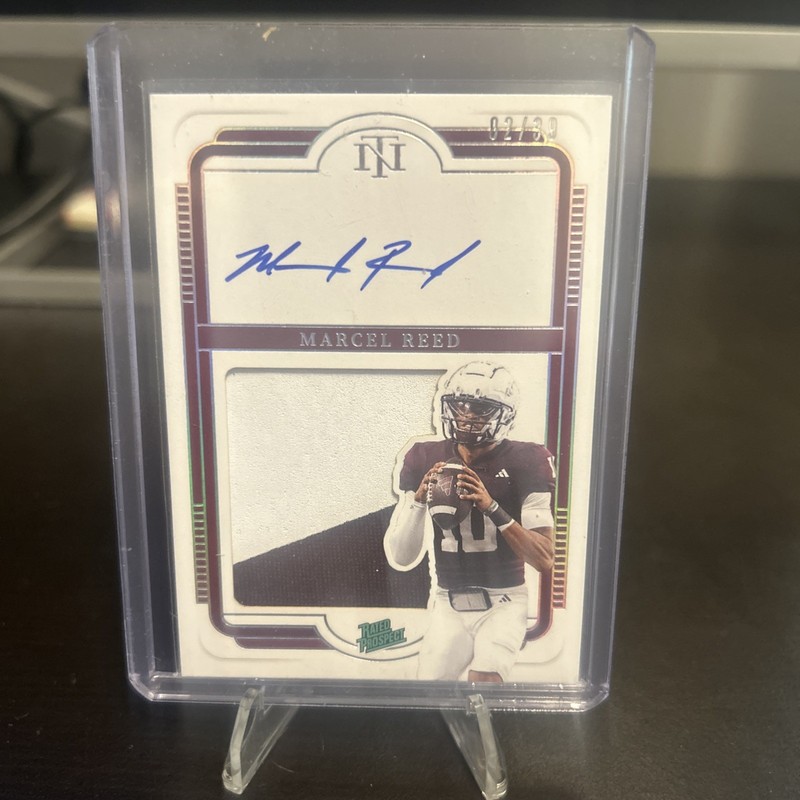 Panini National Treasures Collegiate 2025 Marcel Reed RC Auto Patch #141 /39