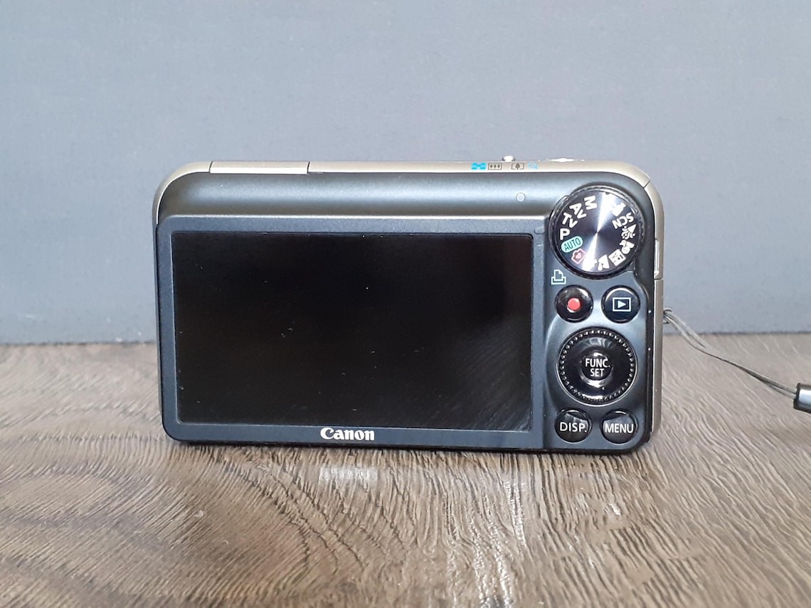 Canon PowerShot SX210 IS 14.1MP 14x Zoom Digital Camera W