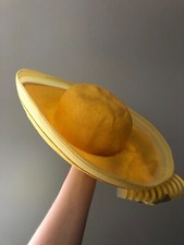 Vintage woman's yellow hat with bow and flowers. Brand Mr. John, Straw.