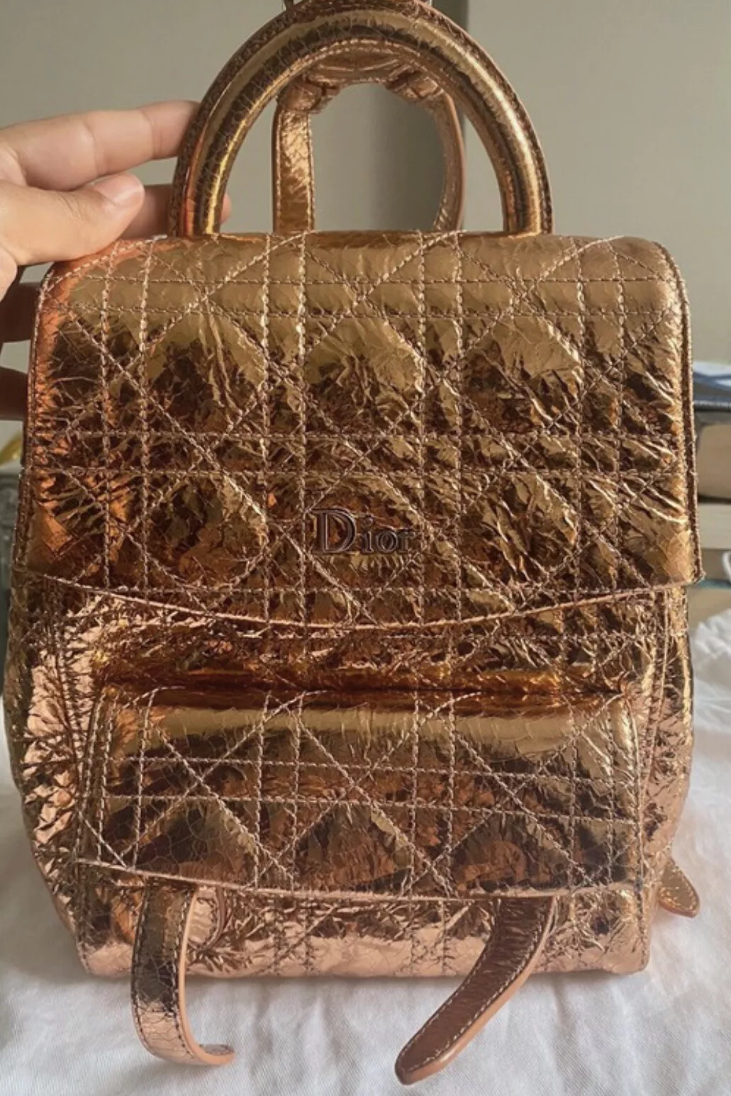 Sac à dos DIOR cuir matelassé rose métallisé cannage poussière d'étoile