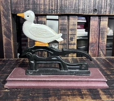 Vintage CAST IRON NUT CRACKER Hand painted DUCK With Wood Base