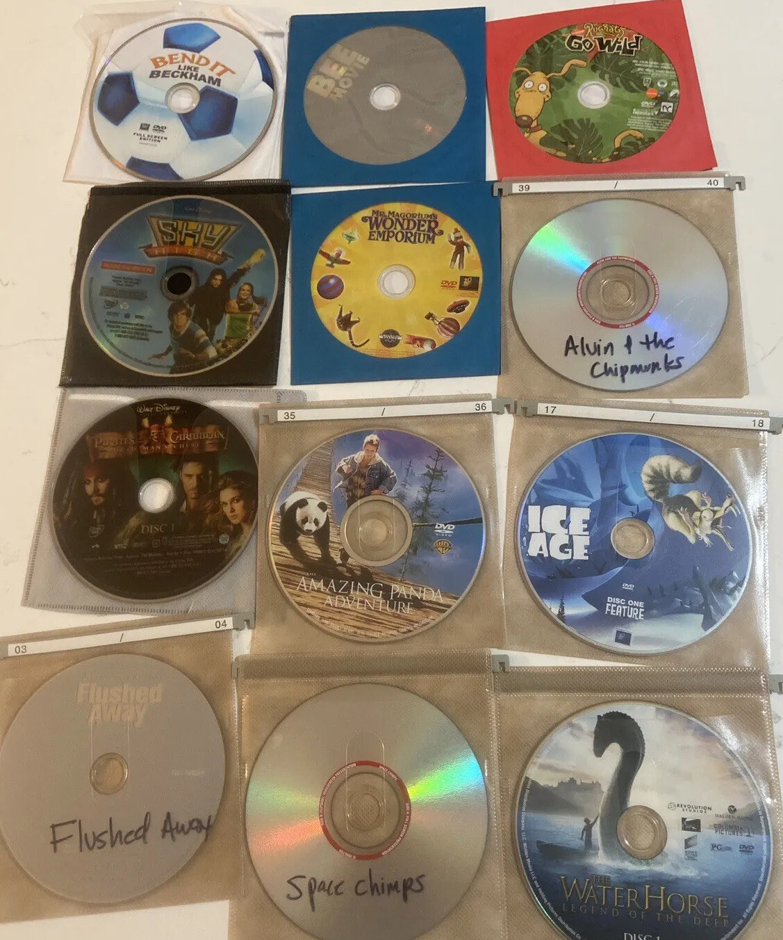 Lot Kids DVDs 12 Childrens DVD Pirates Rugrats SkyHigh DVD NO CASES