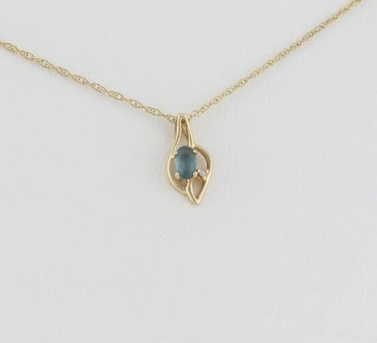 Collar de oro amarillo de 14k con topacio azul natural y diamantes cadena de 18" Foto 4 de 4