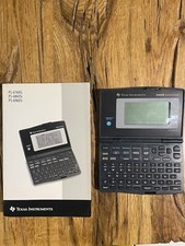 Texas Instruments PS-6960Si 256KB Synchronized Calculator Con Manuale
