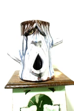 dal burtchaell  (stump jug )  face jug, pottery,      ( 9 '' t x 7'' w)