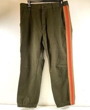 Gucci women's pants size 46 Italian sizing translates to a US Size 10 or 12.