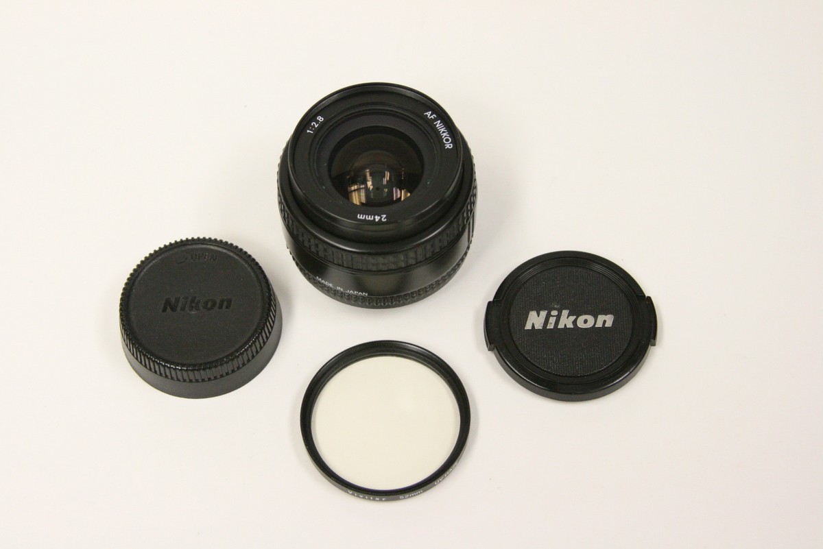 Nikon Nikkor AF 24mm f2.8 lens with UV filter and caps | eBay Nikon Nikkor AF 24mm f2.8 lens with UV filter and caps | eBay