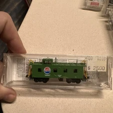 Micro Trains N Scale 36' Riverted Steel Side Caboose Pepsi-Cola #10007