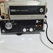 EUMIG MARK S 807 D PROJECTOR. --- Turns on ---Not tested. Needs repair.