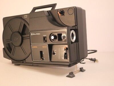 Bell and Howell Lumina II Projector, Model MX33 Turns On And Spins