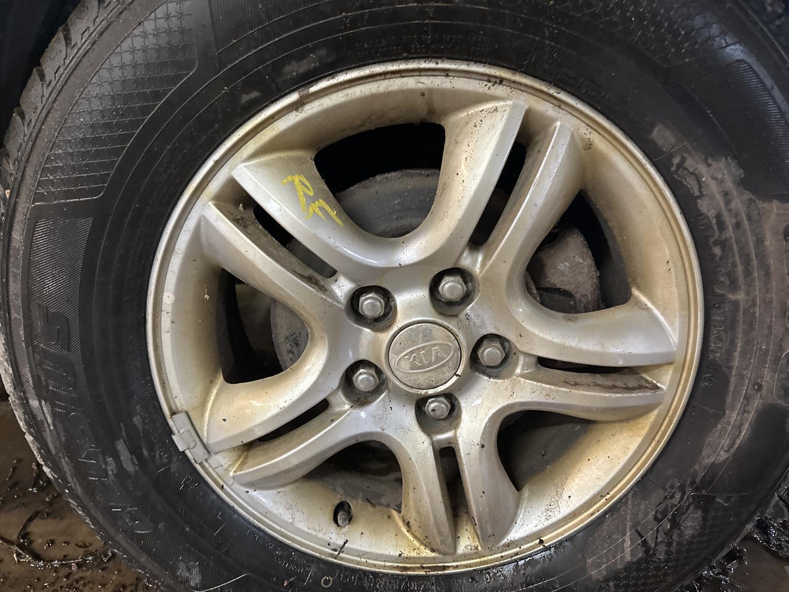 Used Wheel fits: 2005 Kia Sportage 16x6-1/2 alloy 10 spoke Grade B