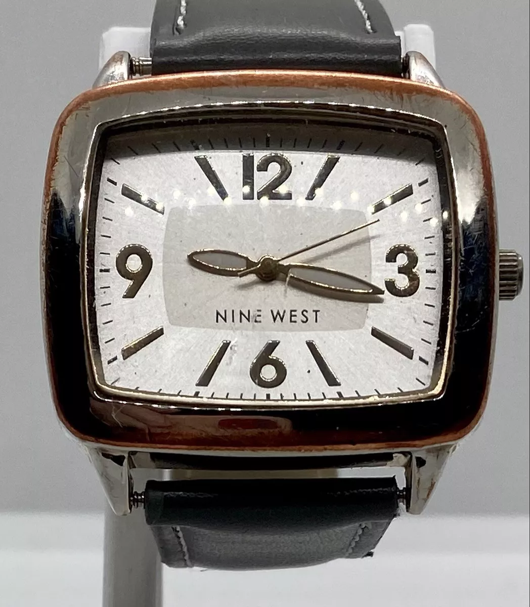 NINE WEST Ladies Watch New Battery Wide Silver Dial Copper Accents Grey Strap