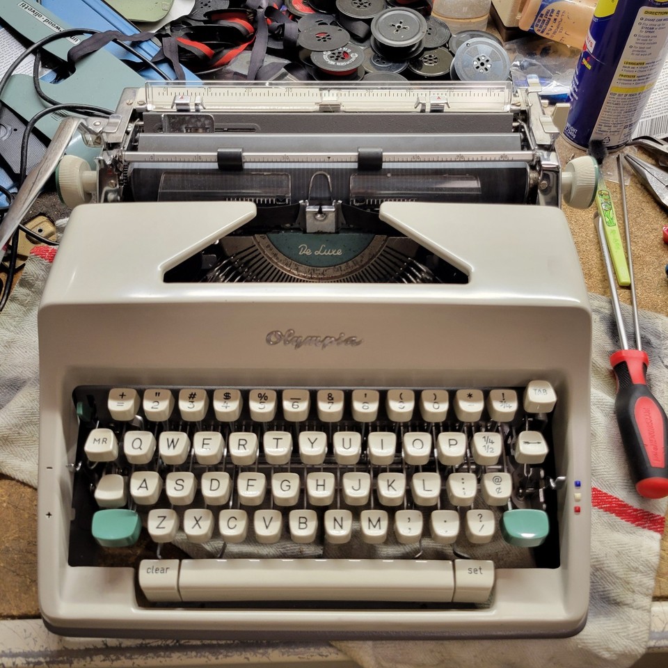 An excellent-condition 1967 German-made Olympia SM9 with case — the gold standard of vintage portables in near-pristine shape.