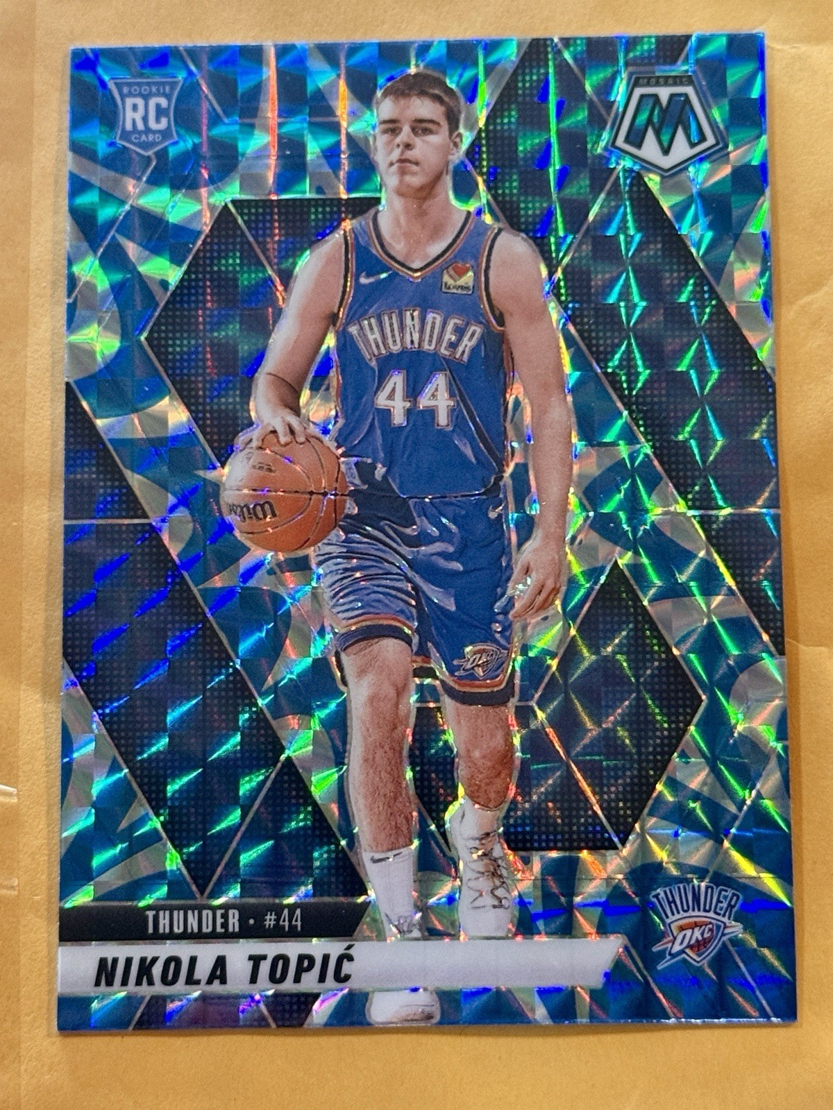 2024-25 Panini Mosaic - Rookies Nikola Topic #242 Reactive Blue Mosaic Prizm RC