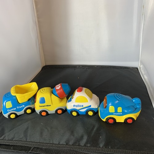 Lote de 4 ruedas Vtech Go Go construcción policía avión volteo camión AD - Imagen 2 de 6