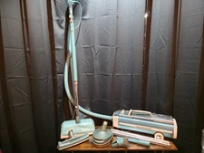 Electrolux vacuum cleaner model 1205 blue with attachments with bags