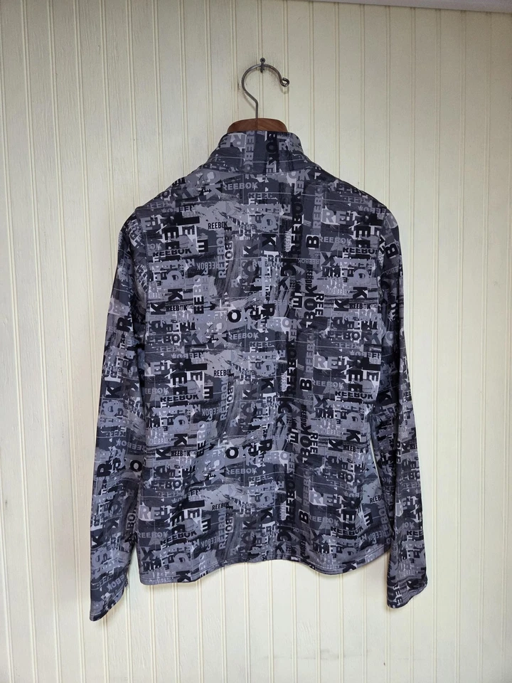 Pullover Reebok para mujer grande gris negro cuarto cremallera estampado de logotipo atlético Foto 3 de 4