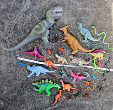Lot of 34 Kids Toy Dinosaurs T- Rex / Stegosaurus, Ankylosaurus Etc. Snakes Bugs