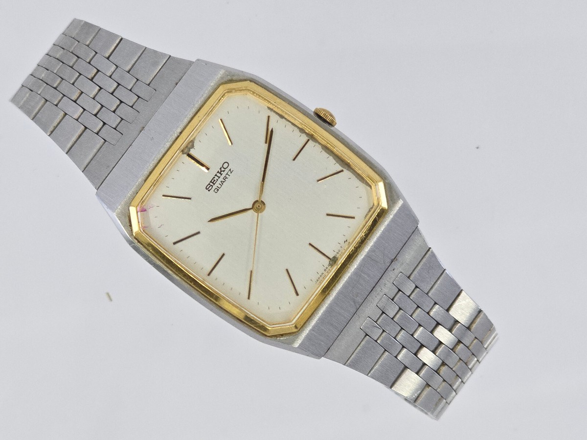 VINTAGE SEIKO 8621 SILVER & GOLD TONE SWEEPING HANDS QUARTZ