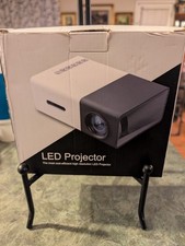 Mini LED Projector - NEW -with Remote- HDMI - Portable New open box complete.