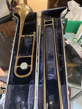 conn 16 h trombone with case and mouthpiece and original marching lyre