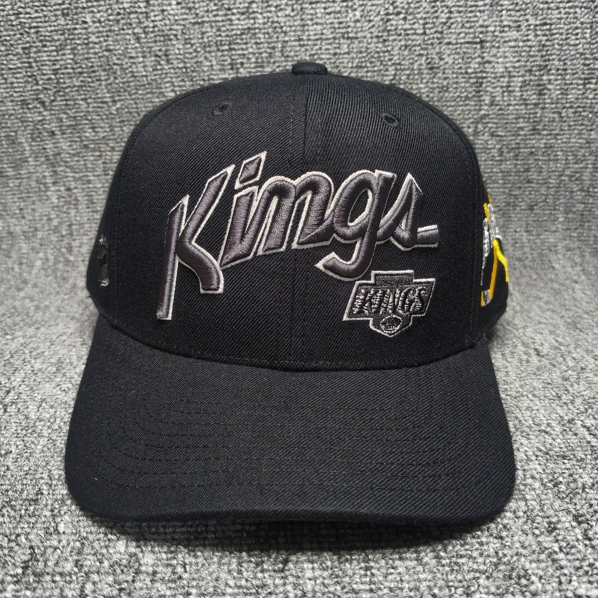 Mitchell & Ness Los Angeles Kings NHL Black Script Logo Strapback Cap