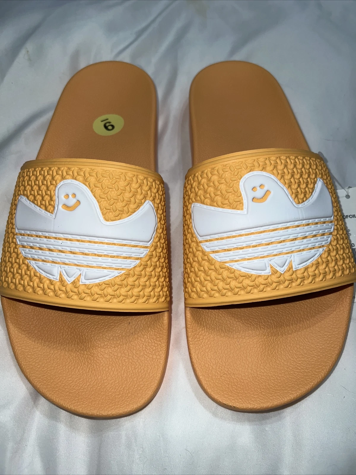 Slides Adidas Shmooil da uomo arancione nebbia bianco fantasma Halloween (FY6850)