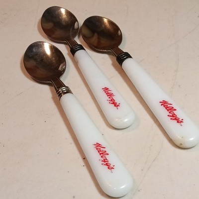 Lot of 3- Vintage Kellogg's White Plastic Handles & Metal Cereal Spoons Kellogg
