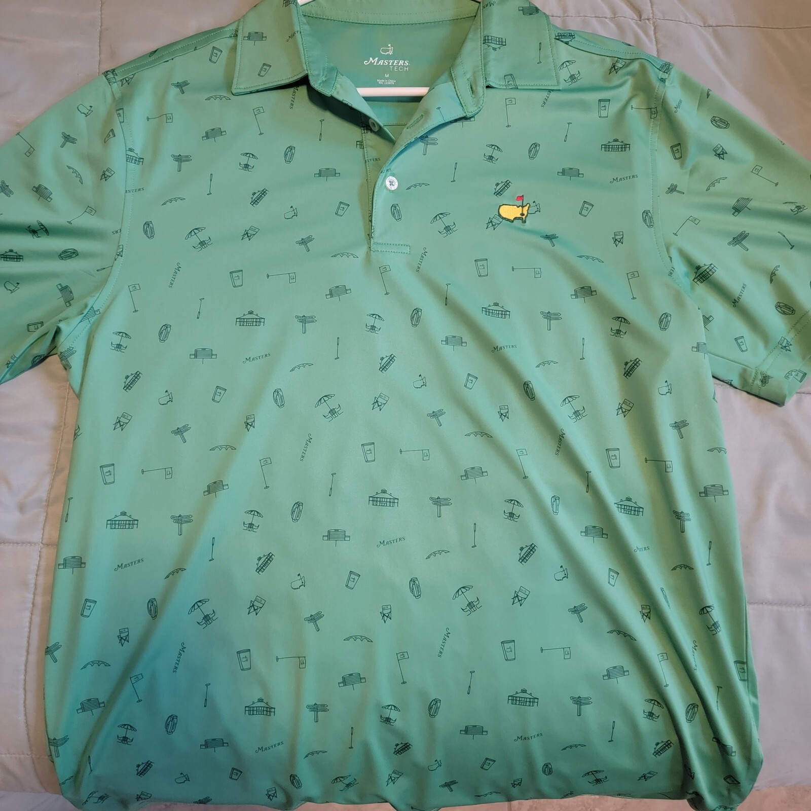 masters green performance tech golf shirt