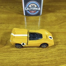 Hot Wheels Vintage Grand Prix Redline McLaren M6A Light Enamel Orange USA 1969