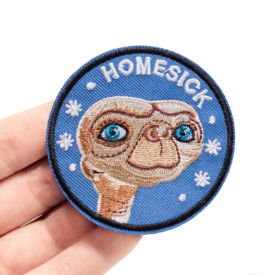 Homesick Alien Snow Sew On Iron On Embroidered Patch Badge Fabric Craft Transfer - Image 1 of 4