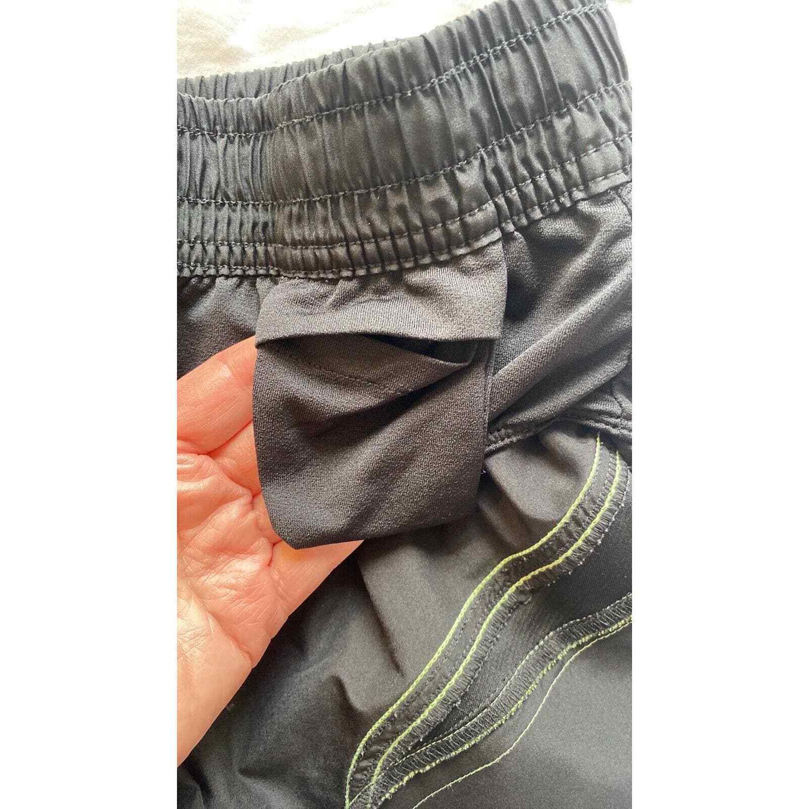 Pantaloncini da corsa Fila donna sm neri riflettenti fluorescenti giallo verde foderati di sicurezza