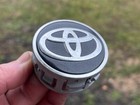 TOYOTA PRIUS OEM WHEEL CENTER CAP BLACK FINISH CHROME LOGO 52170 A550