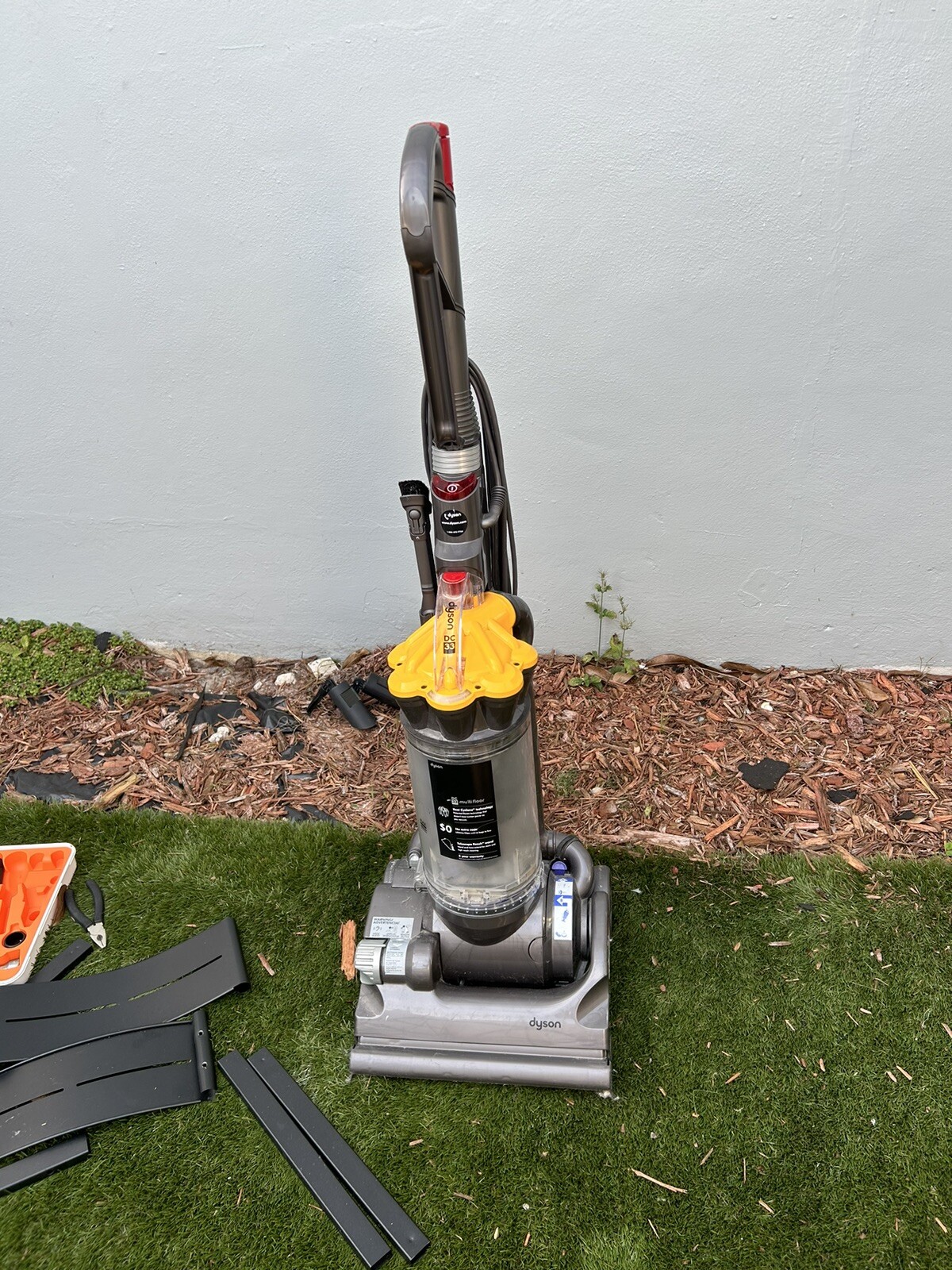 Dyson DC33 MultiFloor Bagless Upright Vacuum Cleaner with Attachments