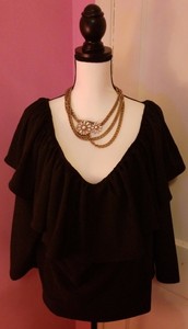 black and gold off the shoulder top