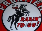 VINTAGE FRONTIER GASOLINE WAINOCO OIL COWBOY+ HORSE 11 3/4" PORCELAIN METAL SIGN