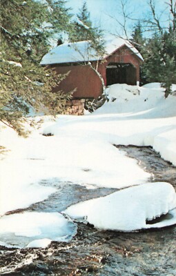 Postcard Snow Fall Covers a New England's Covered Bridge