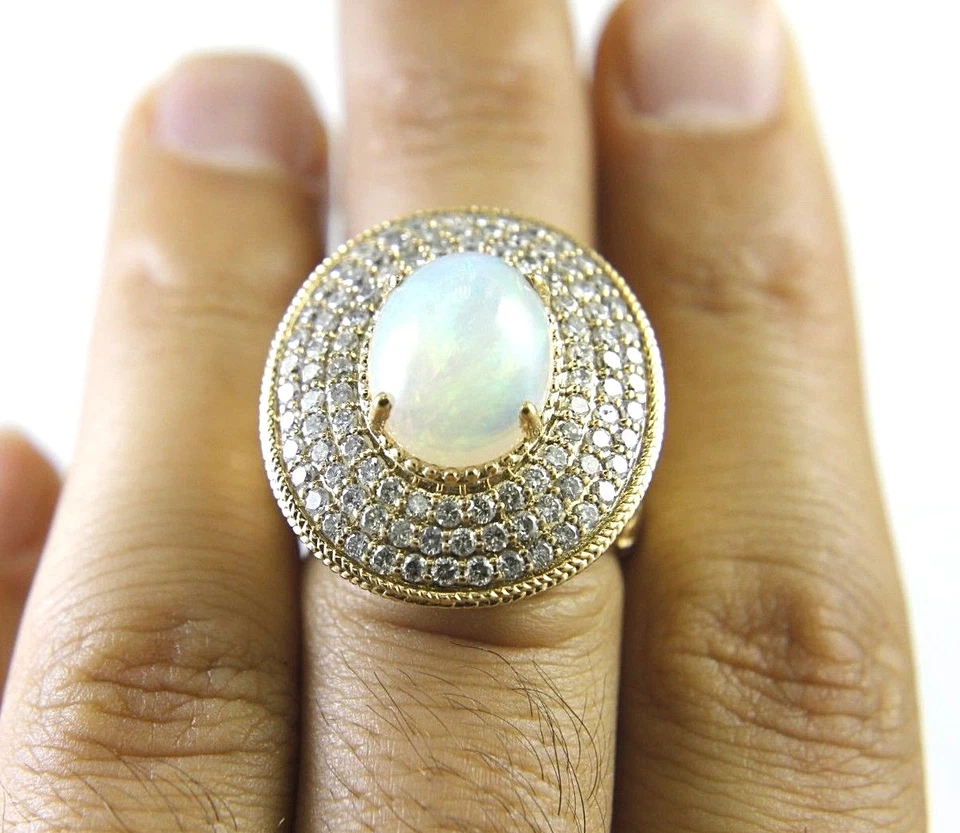 Anel solitário de ouro amarelo 14k com opala de fogo oval natural e halo de diamante 5,45 quilates - Imagem 4 de 4