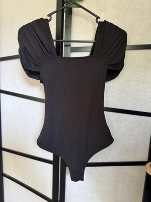 Women s Intimately Free People black ribbed short sleeved body suit size xs/s