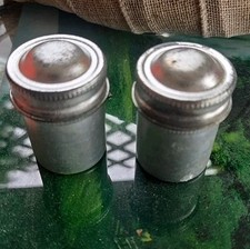 2 vintage aluminum film canisters