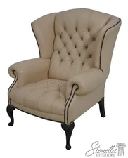 64031: Chesterfield Style Tufted Creme Leather Wing Chair