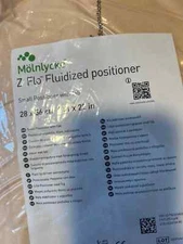 Molnlycke Z-Flo Fluidized Positioner W/Tabs 11 x 22" New 1401001